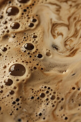 Close-up of coffee foam and swirl pattern. Beverage texture concept.