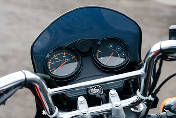 speedometer instruments on front panel of motorcycle