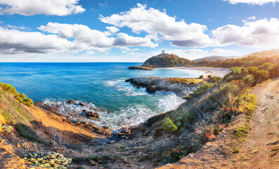 Astonishing View of beautiful Chia bay and wonderful beach with Torre di Chia tower.