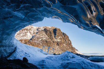 Beautiful view of an ice cave and surrounding area in Vatnajokull National Park (South Iceland)