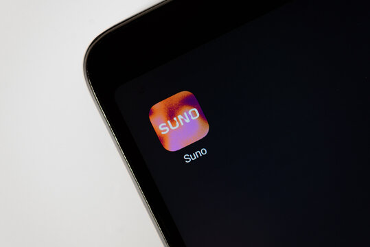 KIROV, RUSSIA - APRIL 12, 2025 Suno icon on smartphone display, mobile application for music creation with ai generation, digital life and technologies, background, copy space