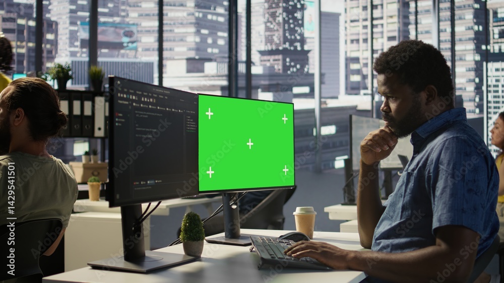 Poster programmer utilizing green screen computer to train machine learning models, zoom in shot. close up 