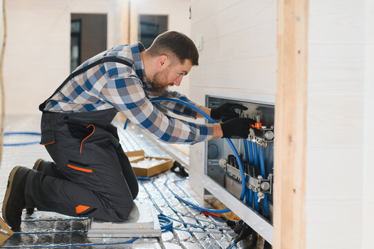 Pipe fitter mounted underfloor heating. Heating system and underfloor heating. Central heating