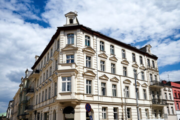 facade of a historic tenement house in the city of Poznan
