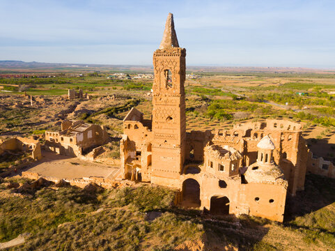 Aerial view of remains of old church tower on ruins of historic town of Belchite, Zaragoza, Spain..