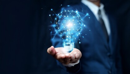 A man in a suit holding a light bulb shaped like a network in his hand against a dark background