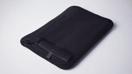 A stylish black tablet case with a clean design, perfect for carrying tech essentials elegantly.