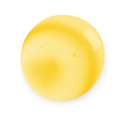 Drop of golden serum on white background
