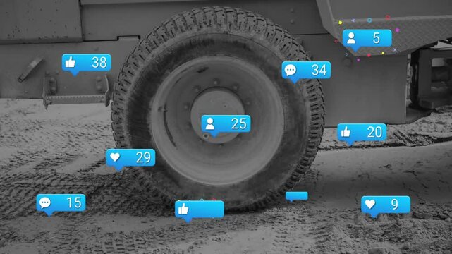 Heavy-duty vehicle tire rolling through muddy ground, displaying blue reaction bubbles, flat design