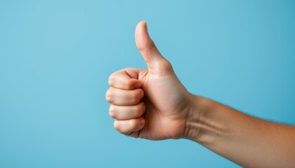 Positive gesture thumbs up sign studio setting image calm background close-up view uplifting concept