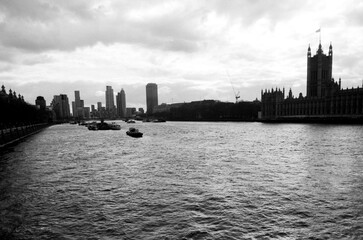 Vintage analog photography of london showing river thames and palace of westminster