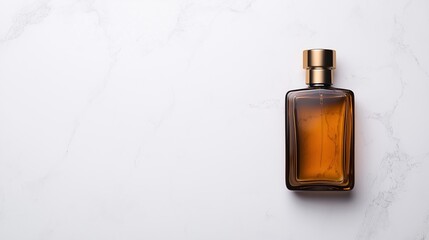 A sleek, amber glass perfume bottle with a gold cap sits elegantly on a white marble surface, exuding sophistication and luxury.