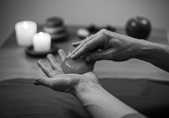 Close-up Hands Applying Gel B&w