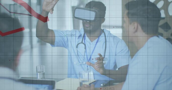 Medical team doctors using VR headset interacting with red and black line graphs in training room