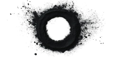 a circular arrangement of black powder creates a striking visual contrast against a white background suggesting themes of art science or material exploration