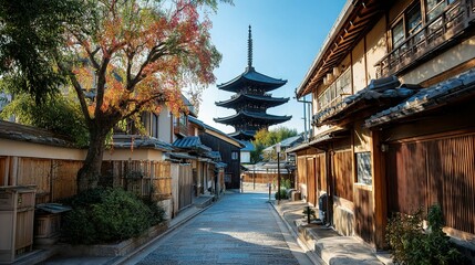 Fototapeta premium Scenic japanese alleyway with pagoda and autumn foliage.