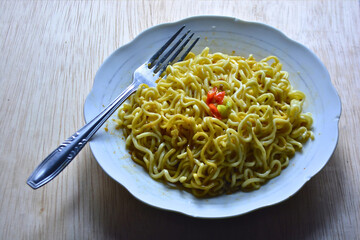 Delicious instant noodles on a plate