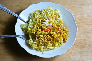 Delicious instant noodles on a plate