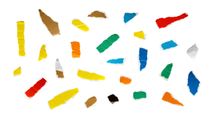 Colorful fragments of broken glass scattered on a white surface, creating an abstract art piece with vibrant hues