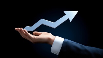 Hand holding upward trend graph