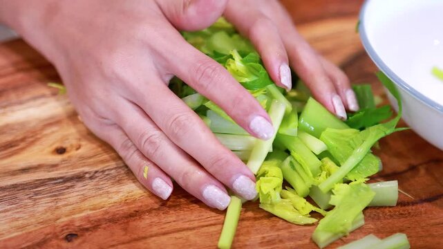 Preparing Fresh Celery in a Kitchen Setting