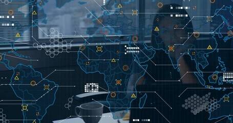 woman sitting at desk analyzing data on laptop in technology office, with hex grid map overlay - Powered by Adobe