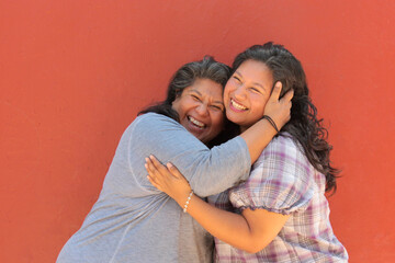A 50-year-old divorced single mother and her 20-year-old Latina daughter show their love and spend time together to celebrate Mother's Day