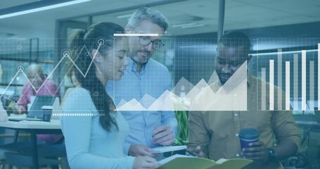 Group of professionals reviewing documents in business office, showing animated bar and line charts