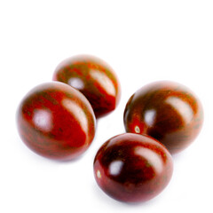 Isolated photo of cherry tomatoes of unique color: red with dark green overlay (striping)for a 