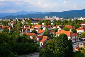 Fototapeta premium Aerial view of Nikšić, the second largest city in Montenegro - Residential area of an important industrial, cultural, and educational center in the Balkans