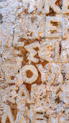 Ancient Greek Inscription On Weathered Stone Monument, Greece, Daylight, Concept Of Language History, Travel, Archaeology, Cultural Heritage, Educational Use, Sustainable Tourism