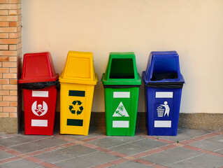 Separate waste bins for recycling, food waste, and chemical waste.