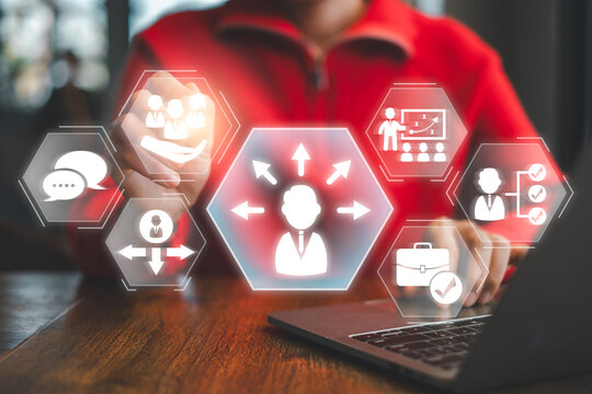 Visual representation of outplacement services with digital icons and a businessperson using a laptop, symbolizing career transition support.
