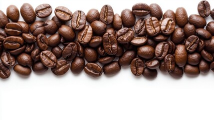 Obraz premium Coffee beans spread on white background showcasing rich color and texture for coffee lovers and enthusiasts