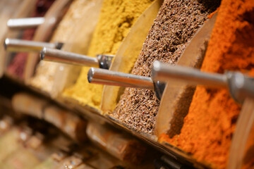 Vibrant display of spices in a market setting showcasing variety