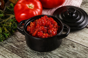 Diced ripe tomato with sauce