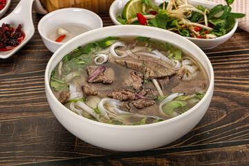 Vietnamese Pho Bo soup with beef and noodles