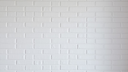 Sleek White Brick Wall with Sunlight Shadows