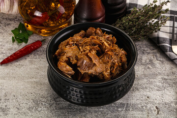 Shredded slow cooked pork meat