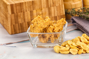 Crunchy peanut butter fat product