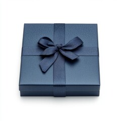 Navy blue gift box with ribbon bow, studio shot