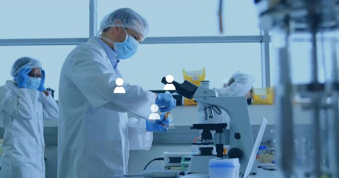 male scientist pipetting sample vial in biomedical laboratory, with animated data charts hovering