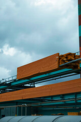 a large industrial building with a cloudy sky in the background photography industrial building clou