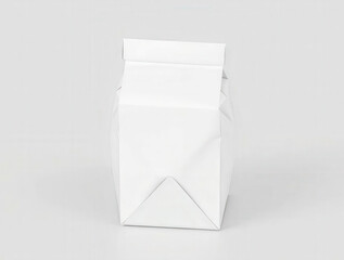 A white carton package standing upright on a plain background surface product photography close up d
