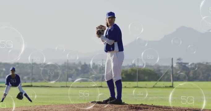 woman pitcher pitching beside ready fielder on baseball park in tech scene with floating 5G bubbles