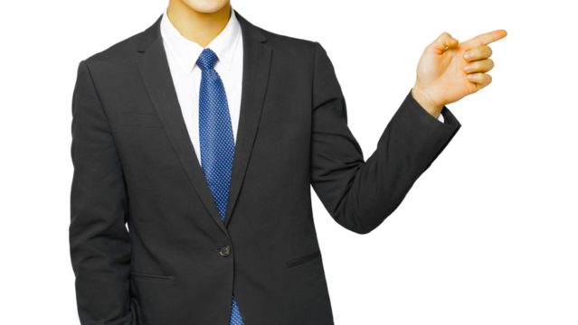 A professional businessman in a suit and tie stands in his office, hand pointing as a symbol of success for other businesspeople.