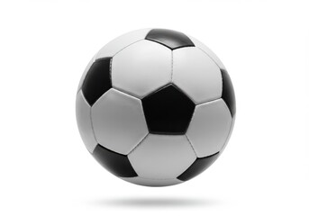 Fototapeta premium A soccer ball with black and white panels is centered on a clean white background in a close up shot