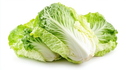 Two heads of fresh Napa cabbage on a white background.