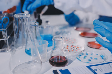 Researcher using a professional microscope