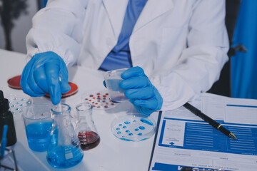 Fototapeta premium Researcher using a professional microscope